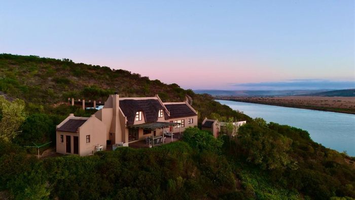 Gouritsmond Rural farm for sale: riverfront, cottages, fynbos, and game fencing.