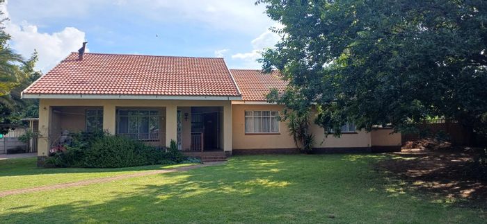 For Sale: House in Kriel Central with 3 bedrooms, garden, and income potential.