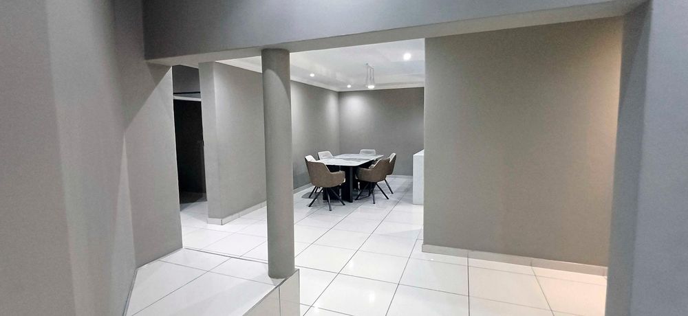 modern clean interior large format white tiles