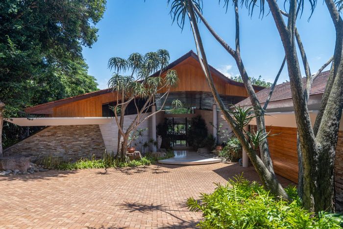 Zimbali House For Sale: Open plan living, pool, flatlet, and golf access.