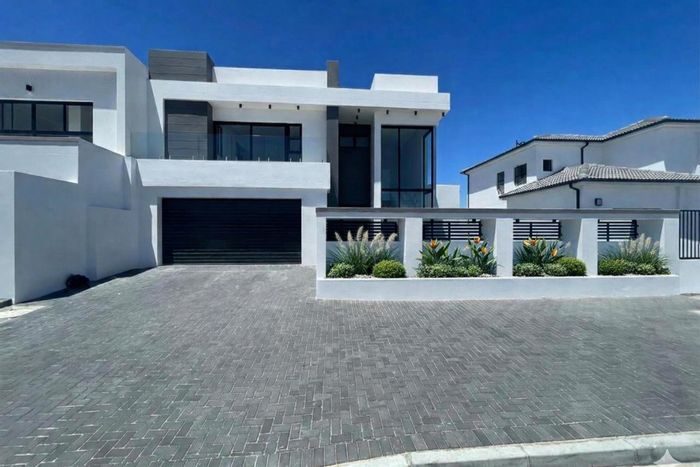 For Sale: Spacious 4-bedroom house in Sandown with pool, braai room, and garden.