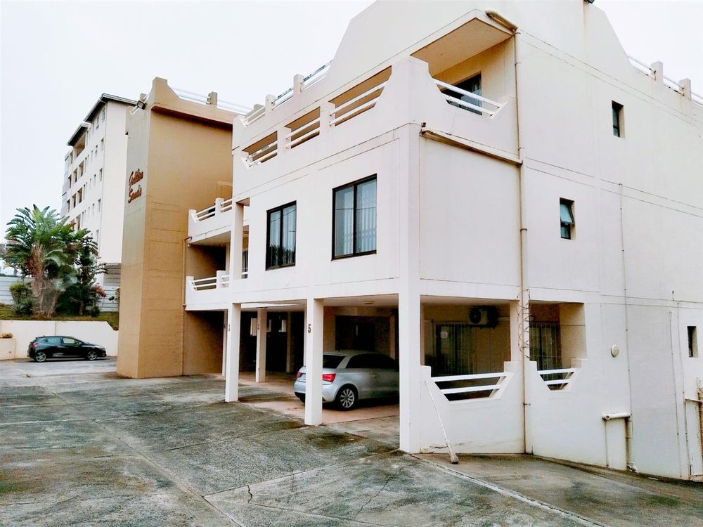 Front view with car port parking