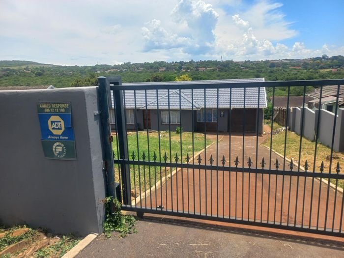 House for Sale in Bisley: Spacious yard, close to amenities and schools.