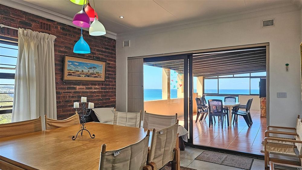 Dining area through to the balcony