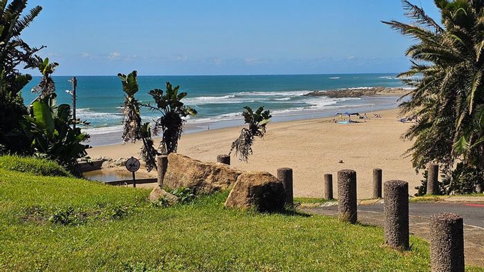 For Sale: Beachfront Townhouse in Marina Beach with garden, security, and parking.