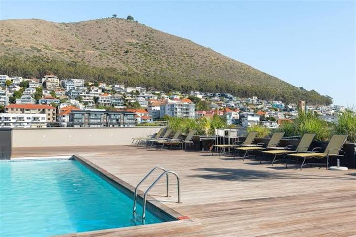 For Sale: 2-bed apartment in Green Point with rooftop pool and concierge service.