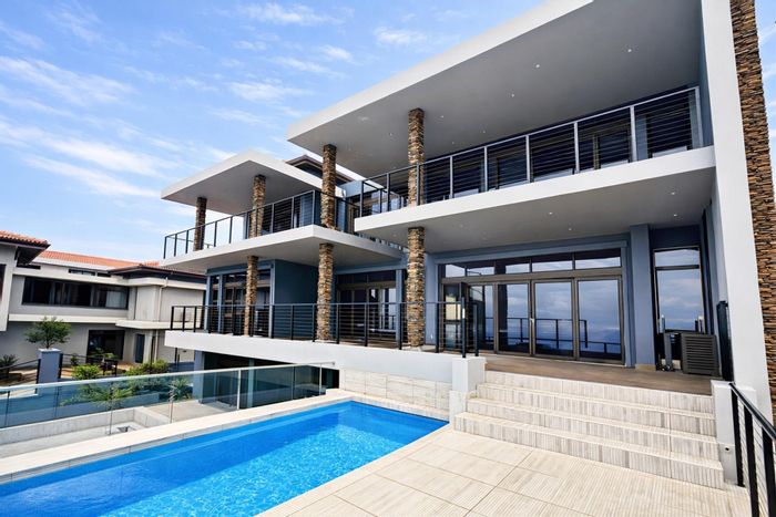 Izinga House For Sale: Ocean views, infinity pool, cinema, gym, 24/7 security.