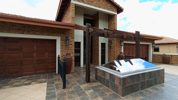 For Sale: 7-Bedroom House in Featherbrooke Estate with Flexible Living Spaces.