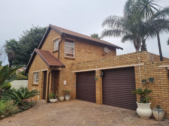 For Sale: Pomona Townhouse with 3 bedrooms, private patio, double garage, and security.