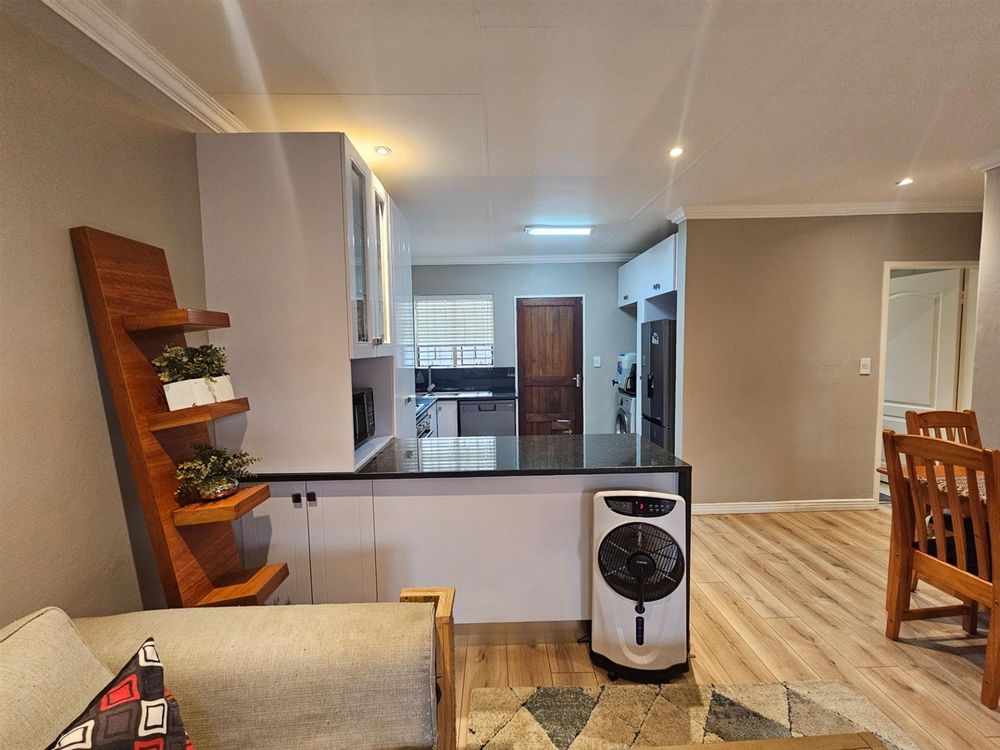 From Lounge to kitchen with breakfast bar