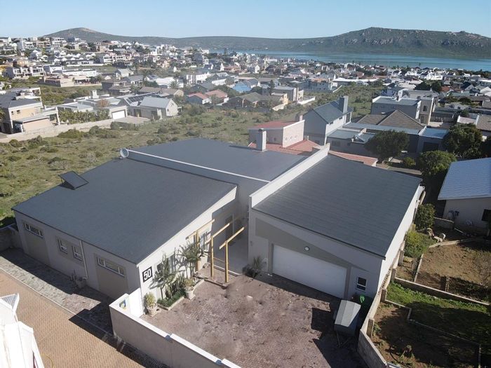 For Sale: House in Myburgh Park with indoor pool, entertainment area, and lagoon views.