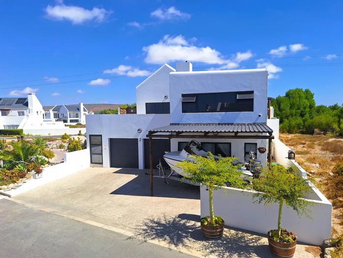 Golden Mile House For Sale: Beach access, sea views, self-contained flatlet, spacious living.