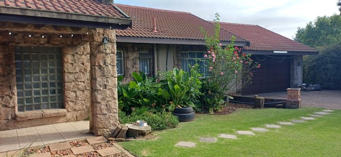 Kriel Central House For Sale: Income-Generating Flatlet, Double Garage, Close to Amenities.