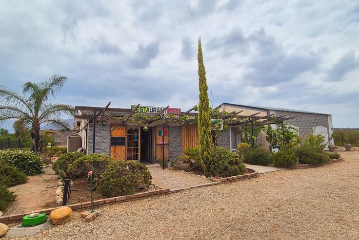Commercial property for sale in Calitzdorp Central: Italian restaurant, studio, and land.