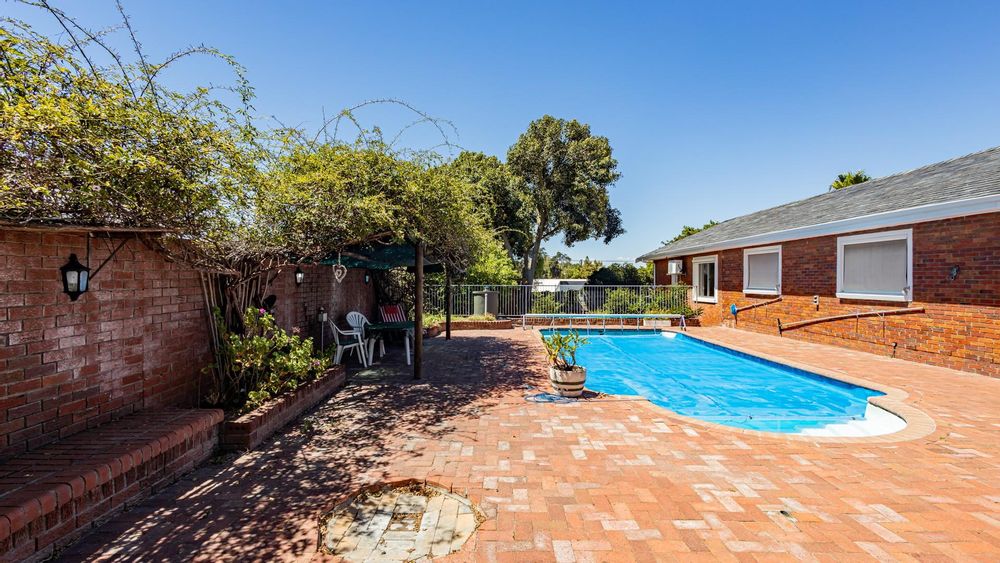 View to pool and house