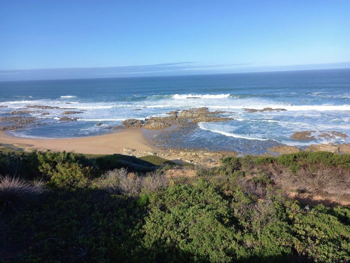 Farm for Sale in Stilbaai Rural: Eco-estate with sea views and hiking trails.