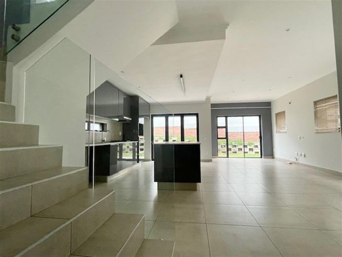 For Sale: House in Sandton Central with 3 en suite bedrooms, garden, and double garage.