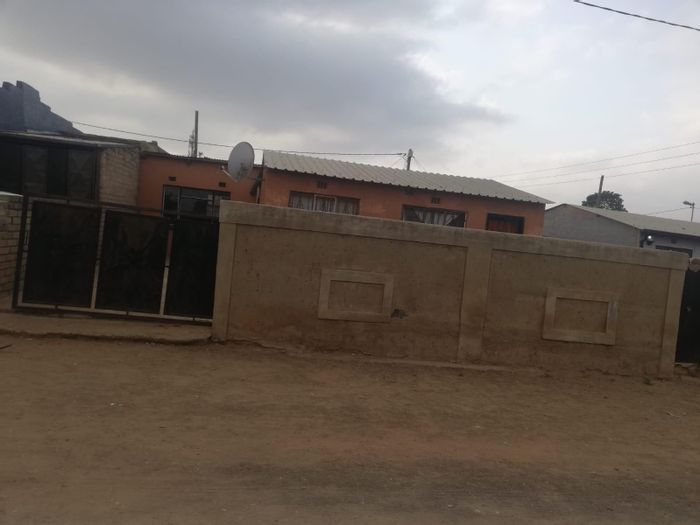 2 Bedroom House in Orange Farm For Sale with garage, outside rooms, and security.