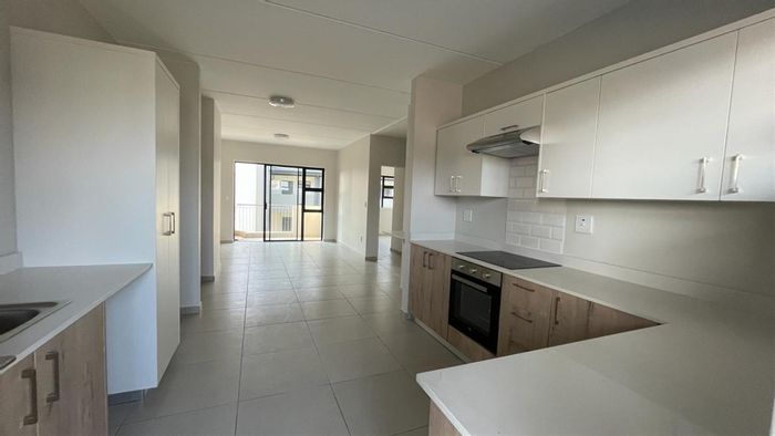 Two-bedroom apartment in Fourways with gas braai, patio, and cozy lounge. To Rent.