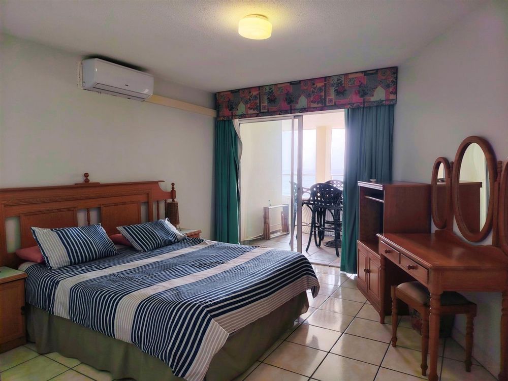 Main bedroom with access to balcony