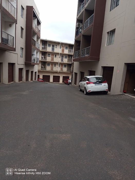 2-Bedroom Apartment For Sale in Woodhurst with balcony, garage, and security access.