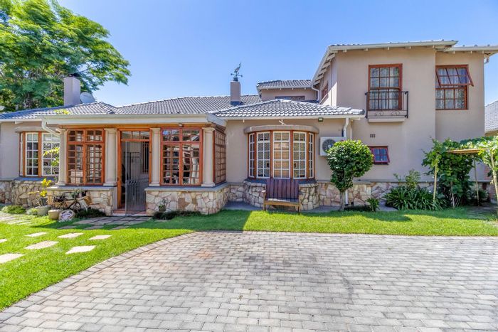 For Sale: Spacious Parkview house with pool, guest cottage, and eco-friendly features.