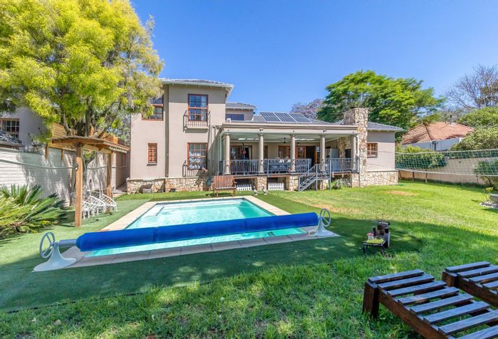 For Sale: House in Parkview with pool, guest cottage, and eco-friendly features.