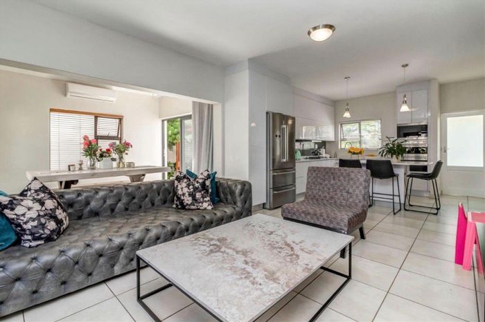 Three-bedroom apartment in Fourways with man cave, patio, and spacious layout. To Rent.