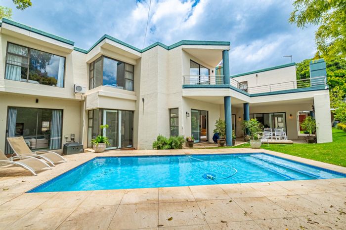 Kyalami House For Sale: Spacious living, pool, study, gym, and staff accommodation.