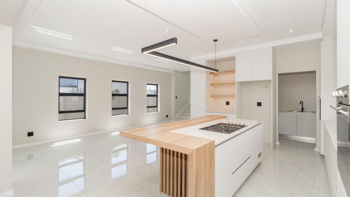 For Sale: House in Sandown with 3 beds, infinity pool, and gourmet kitchen.