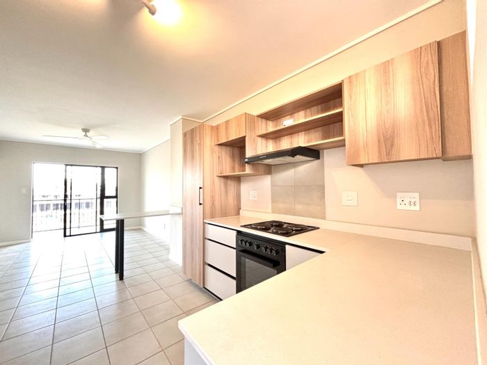 Ballito Central Apartment To Rent: 2 beds, balcony, estate amenities, 24-hour security.