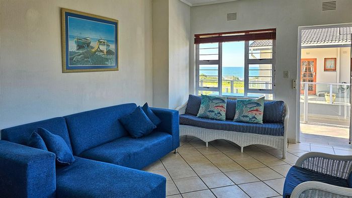 For Sale: Uvongo Beach Apartment with sea views, balcony, pool, and pet-friendly.