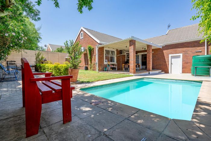 Charming Pinehurst house for sale with pool, garden, and secure estate living.