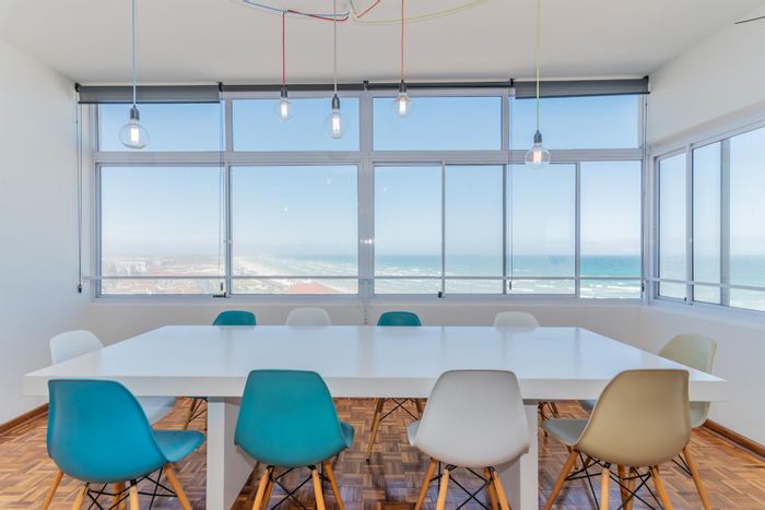 3-Bedroom Apartment To Rent in Muizenberg Central with ocean views and secure parking.