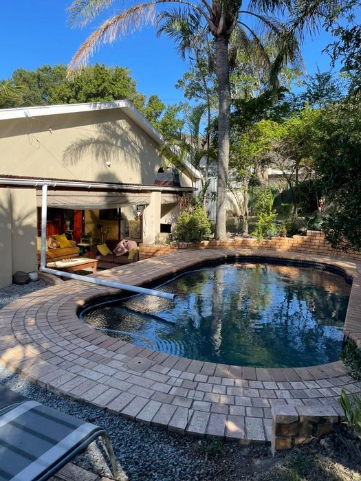 For Sale: Spacious 3-bedroom house in Beacon Bay with pool, flat, and garden.