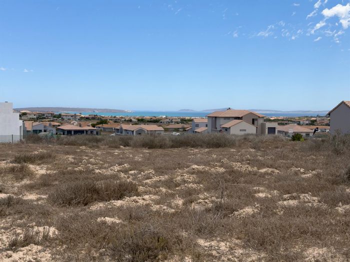 Vacant Land Residential in Langebaan Country Estate with lagoon views and plans included. For Sale.