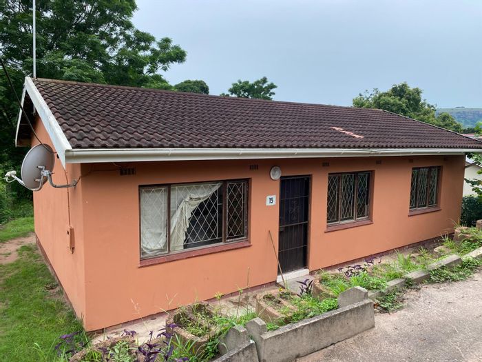 For Sale: House in KwaNdengezi with spacious yard, parking, and family-friendly layout.