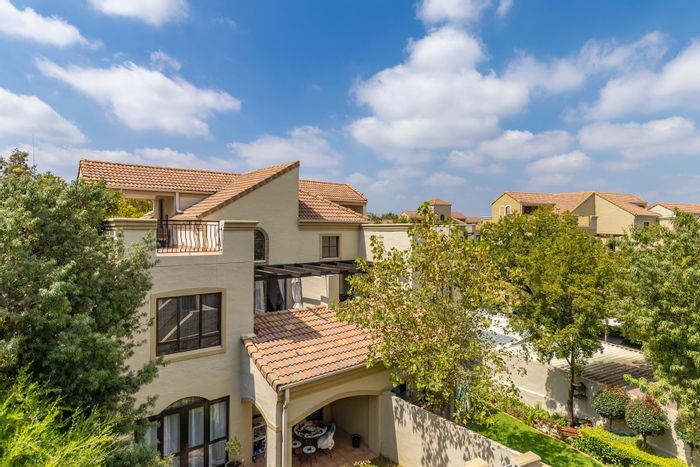 For Sale: 2-Bedroom Apartment in Douglasdale with dual balconies and loft-style layout.