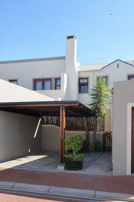 For Sale: Townhouse in Wellington North with garden, garage, and secure complex.