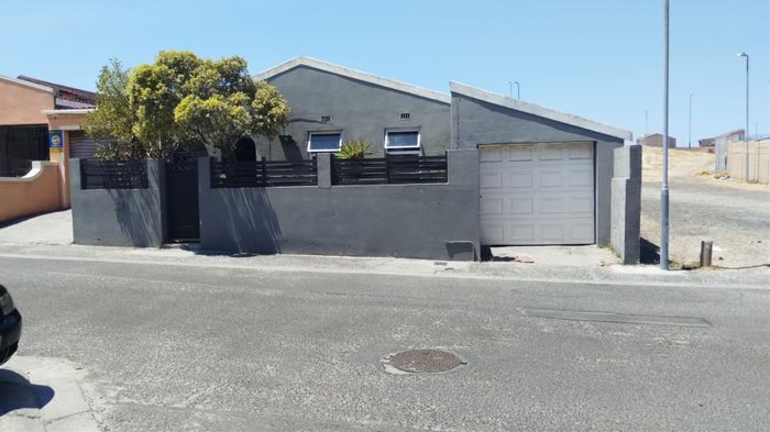 3-Bedroom Townhouse For Sale in Strandfontein Central, near beach, pet-friendly, garage.