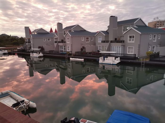 Canal-front apartment for sale in Marina Martinique with direct water access.