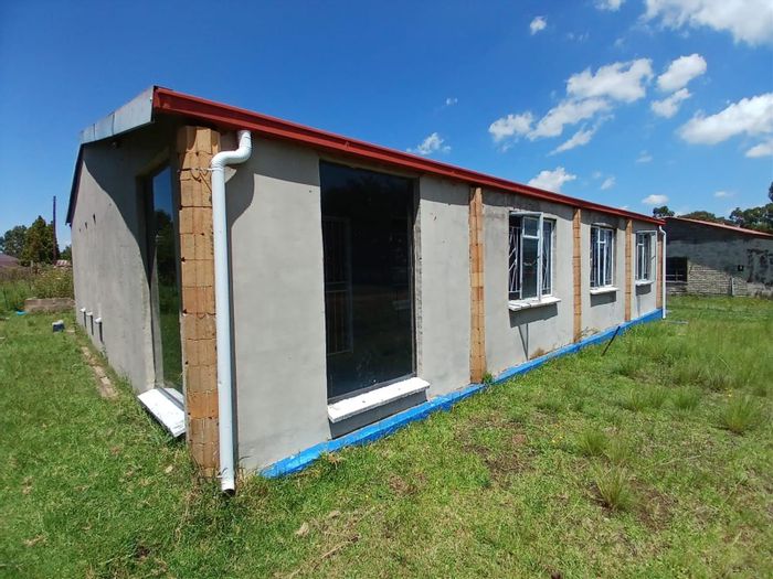 Memel Central House For Sale: Two properties, workshop, borehole, spacious land.