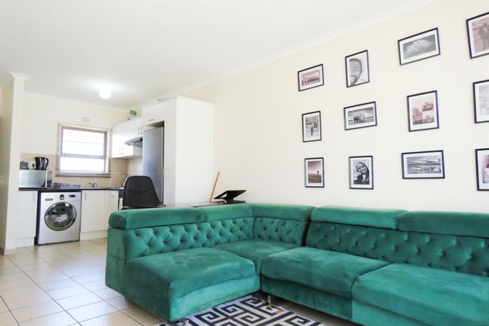 2-Bedroom Apartment To Rent in Parklands with security, open-plan living, and outdoor access.