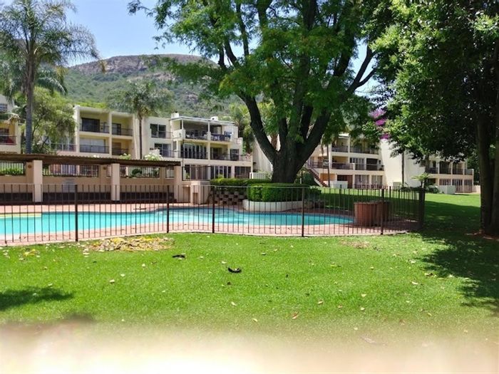 2-Bedroom Apartment For Sale in Kosmos with pool, tennis court, and boathouse.