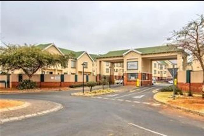 Terenure Townhouse For Sale: 2 bedrooms, secure complex, open-plan living space.