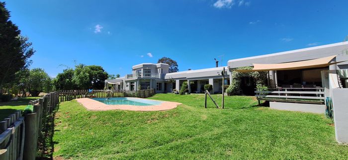 Farm with guest cottages, irrigation, and dual title deeds in Riversdale Rural. For Sale.