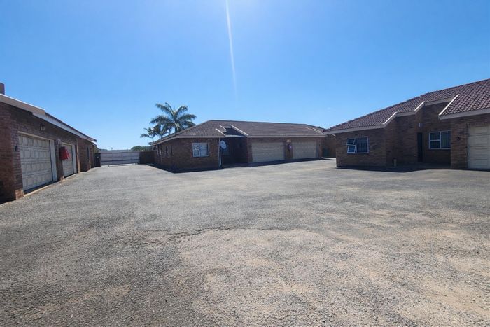 For Sale: 4-bedroom townhouse in Richards Bay Central with private garden and double garage.