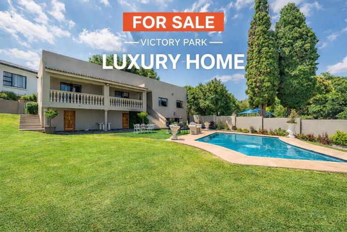 For Sale: Spacious Victory Park house with cottage, pool, and staff quarters.