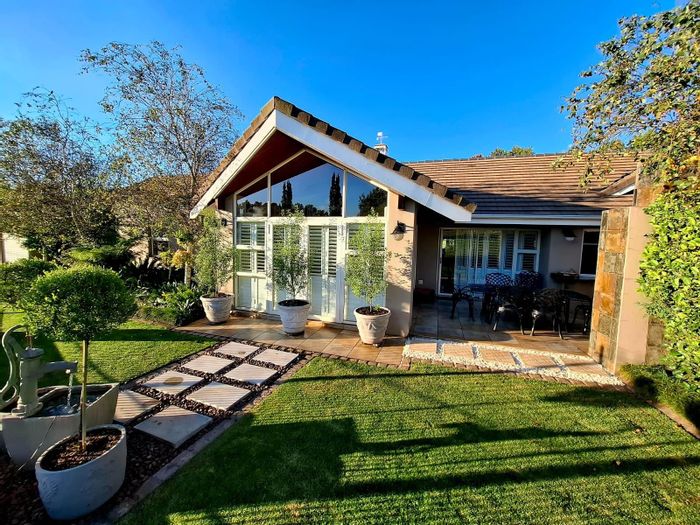 For Sale: House in Clubville with golf course views, pool, and bar room.