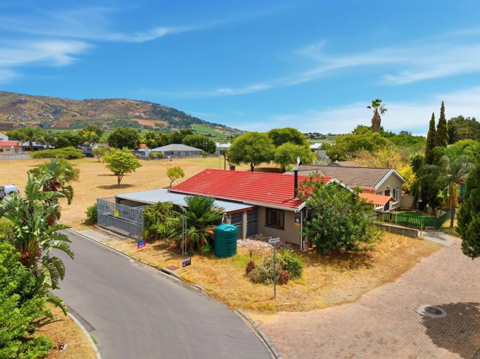 3-Bedroom House For Sale in Paarl North with garage, braai area, and air conditioning.